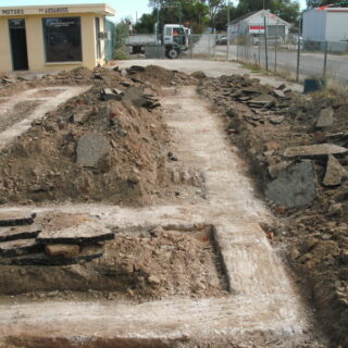 Searching for evidence at police dig