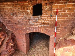 Stoking hole for the fire that heats the kiln