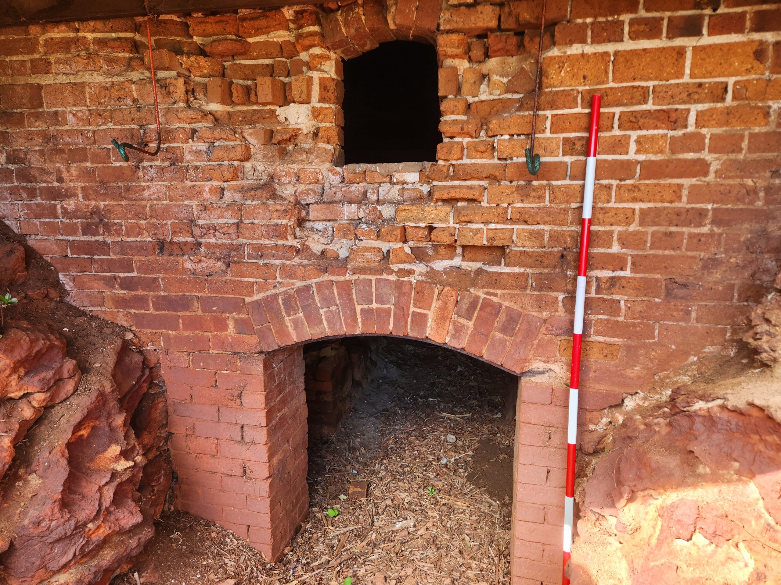 Stoking hole for the fire that heats the kiln